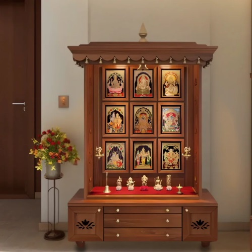 A tall wooden pooja mandir featuring nine framed image panels and a wide base, isolated on white.